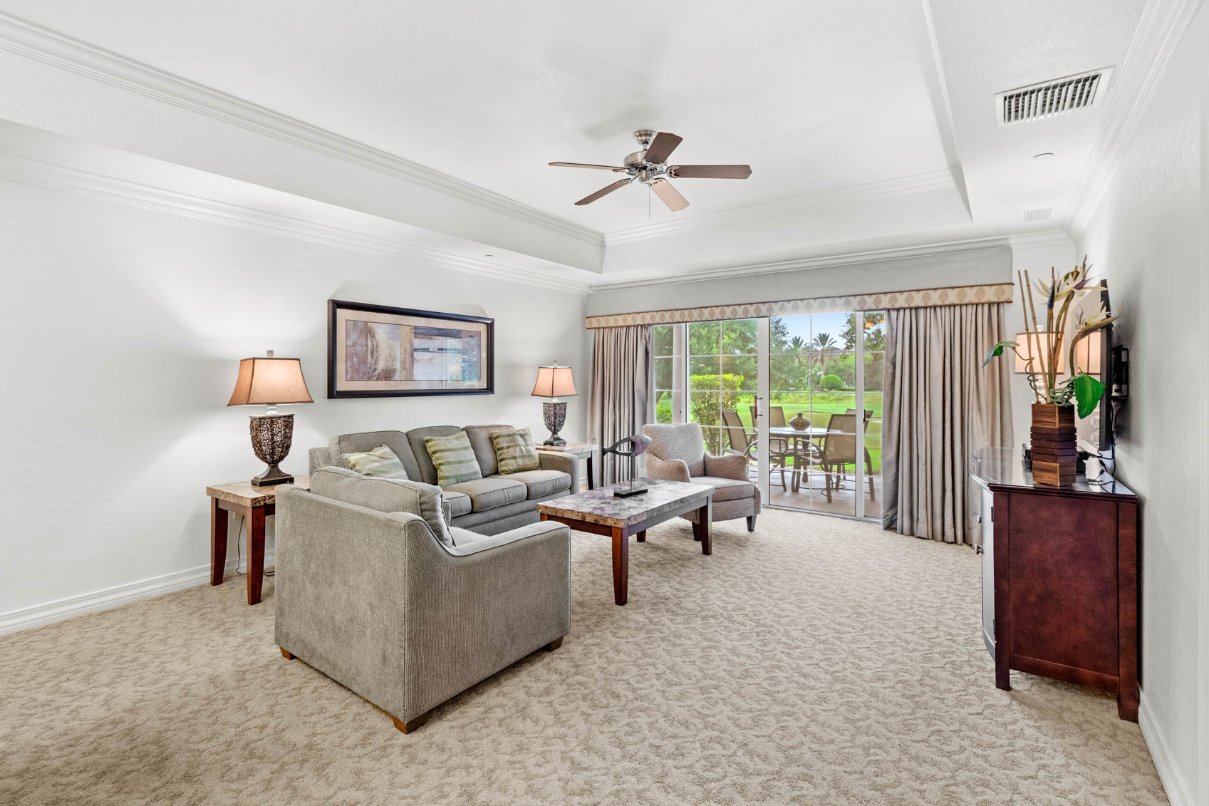 living room with grey couches and contemporary furniture